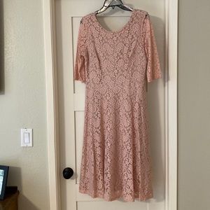 Light pink lined lace dress. Great for a Barbie theme look!